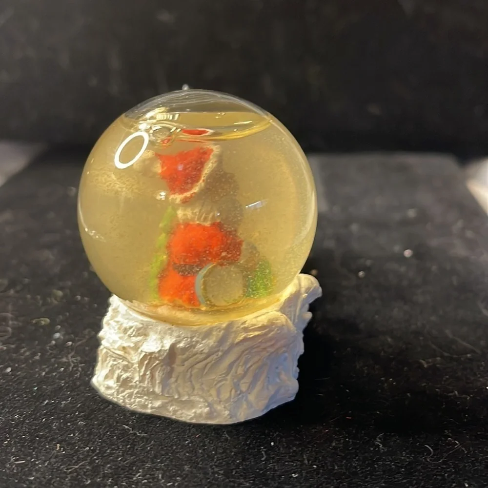 Small Snow Globe Lighthouse w/red roof house-color is clouded Santa is a floater